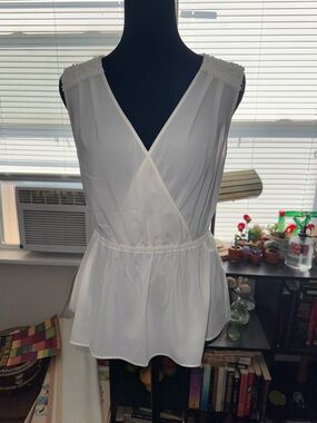 JW White Sleeveless Blouse with Peplum Detail
